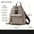 Coffee brown large monogram backpack for women with a white plush pompom charm - Coffee Large