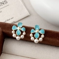 Macro detail of blue enamel flower earrings with golden core and white pearl accents - Blue Enamel Six Pearls Style (A-1638)