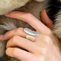 Close-up of a silver wide open ring with a brushed matte finish on a faux fur background - Leaf Shaped Open Brushed Style (C-97) / Silver