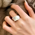 Modern minimalist silver brushed metal ring with asymmetric streamlined design worn on hand - Irregular Wave Brushed Style (C-27) / Silver