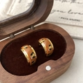 Detailed close-up of leopard print enamel gold earrings in a premium wooden gift box - Brown Leopard Print Enamel (A-1889)