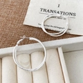 Close-up of silver geometric double-hoop earrings with a fine matte sandblasted finish - Silver Double Layered Circle Style (A-1777-银色耳环)