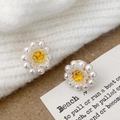 Close-up of daisy stud earrings with pearl petals and yellow crystal center on knit sweater - A-1109-Yellow Center Studs