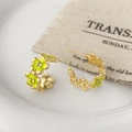 Detail of gold C-shaped hoop earrings featuring yellow enamel flowers and crystals - Green Enamel Flower Hoop Earrings (A-1438)