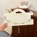 Elegante bracciale dorato con quattro farfalle in zirconi micro-pavé da donna - Oro
