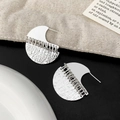 Close-up of silver geometric stud earrings with polished finish and mesh texture design - Mesh Half Moon Patchwork Style (A-1794-Silver)
