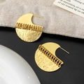 Detail of gold crescent stud earrings showing smooth finish and textured mesh pattern - Mesh Half Moon Patchwork Style (A-1794-Gold)