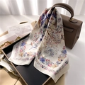 Elegant floral silk scarf with bird pattern tied on a handbag in natural light - Pink and Orange Floral Bird Pattern (FJ694-2)