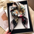 Detail of silk-like square scarf with floral and letter prints in a luxury gift box - Black