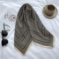 Detail of herringbone pattern silk scarf with elegant sunglasses and coffee lifestyle setup - 68*68cm / Black Beige
