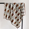 Detail of silk square scarf featuring vintage arch patterns and premium hem stitching - Brown Retro Arch Pattern (FN110-1)