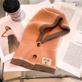 Detail of knit balaclava hat with button closure and ribbed texture in pink and grey - Orange Pink and Gray