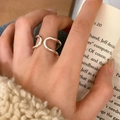 Close-up of minimalist silver wave ring worn on finger with soft knit sweater background - Silver - Double Layer Wave Style (C-411)