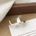 Detailed view of silver twisted C-shape earrings with a brushed matte metal finish - Silver Open Twisted C-shaped Brushed Stud Earrings (A-1913)