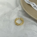 Detail of gold double-layer twisted rope ring with adjustable open band on white paper - Adjustable Open / Shiny Gold Double Layer Ring