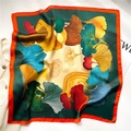 Close-up of colorful ginkgo leaf print silk scarf with bright orange stitched edges - 70x70cm / Green Ginkgo Leaf Style (FJ657-2)