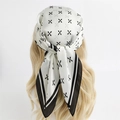 Minimalist black and white silk square scarf worn as a headwrap on wavy blonde hair - Bandana / White Base Black Cross Pattern (FJ602-2)