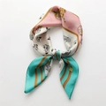 Detail of luxury silk square scarf featuring classic horse carriage print and soft pink colors - Pink White Green Patchwork (FJ613-3)