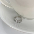 Detailed close-up of leaf-shaped silver ring with sparkling marquise-cut zircon stones - Adjustable Open / Silver