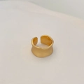 Macro detail of wide matte gold ring with irregular wavy edges and brushed texture - Gold Matte Wide Band Ring