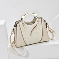 Chic off-white leather handbag with floral relief and golden cat-ear metal handles - Printed Beige