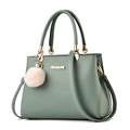 Fashionable sage green crossbody handbag with golden hardware and fluffy pearl charm - Mint Green