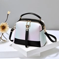 Gradient pastel PU leather Boston bag with black trim and gold hardware in studio setting - Black Gradient