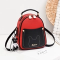 Mini zaino rosso e nero con ciondolo a orsetto e dettagli di design con orecchie di gatto - Rosso