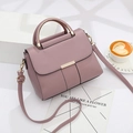 Chic dusty rose pink handbag for women featuring gold hardware and adjustable strap - Dusty Pink