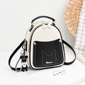 Mini zaino in pelle Saffiano bianco e nero con ciondolo a forma di orso e oro - Patchwork Nero