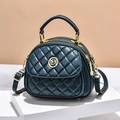 Dark green quilted leather crossbody bag with golden hardware and top handle - Teal