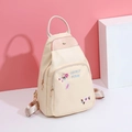 Beige oxford fabric backpack with floral embroidery and rose gold metal hardware details - 3599 Beige