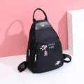 Mini zaino nero in tessuto Oxford con ricami floreali e cerniere dorate - Nero (Ricamo Floreale)