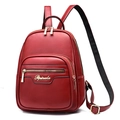 Chic red faux leather backpack with litchi texture and adjustable shoulder straps - Red