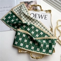 Detail of double-sided silk twilly with green floral and houndstooth patterns on gold tray - Dark Green Floral And White Houndstooth (LJ21-H114)