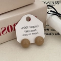 Close-up of khaki spherical stud earrings on white copper material card display - Round Ball Studs (A-31) / Milk Tea (A-31)