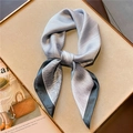 Detail of elegant striped silk scarf with knot styling on a minimalist display board - 70x70cm / Gray White Black Grid Geometric Style (FJ560-2)