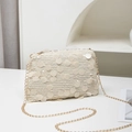 Creamy white sequined chain bag with gold hardware and sparkling layered finish - Champagne