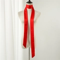 Detail of a vibrant red satin skinny scarf tied on a mannequin neck with silky texture - True Red (LJ16-63) / 190*5cm
