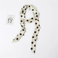Detailed view of an elegant cream long narrow scarf with classic black polka dots pattern - Beige Black Polka Dot (LJ16-89) / 190*5cm