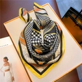 Houndstooth silk square scarf with geometric chain patterns displayed on tray - Yellow Orange Chain Pattern (FJ539-3)