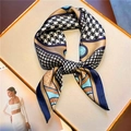 Detail of silk scarf with houndstooth and blue geometric patterns in a gold tray - Blue Gold Geometric Disk Pattern (FJ539-4)