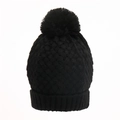 Close-up of black cable knit beanie featuring soft faux fur pom-pom and ribbed cuff - Black