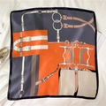 Elegant 70cm square silk scarf featuring orange and grey horse chain patterns - Yellow Grey
