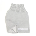 Macro detail of knitted snood scarf with warm fleece lining and embroidered letter patch - Light Gray