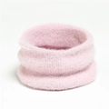 Close-up of soft pink knitted mohair neck warmer with fuzzy texture for winter warmth - Pink