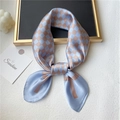 Elegant checkerboard silk scarf in light blue and bronze, stylishly knotted on a stone base - 70x70cm / Light Blue and Bronze Checkerboard (FJ473-1)