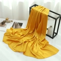Close-up of bright yellow scarf showing fine texture and draped on a black stand - Yellow (TH35-1) / 180x70cm