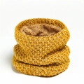 Detail of ginger knit neck warmer featuring thick brown fleece lining for winter warmth - Yellow