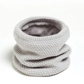 Detailed view of light gray knitted neck warmer with thick faux fur lining texture - Light Gray